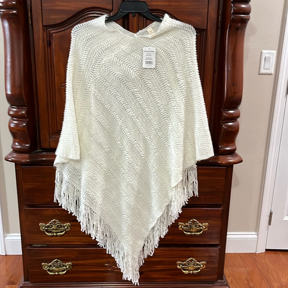 Pull over Shaw one size shawl 100 percent acrylic. Color White